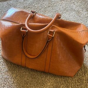 Brand new Louenhide duffel bag